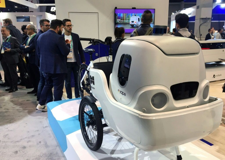 An electric cargo bike from Italian startup Measy uses a delivery robot from sister company Yape for multimodal transportation at the 2020 Consumer Electronics Show