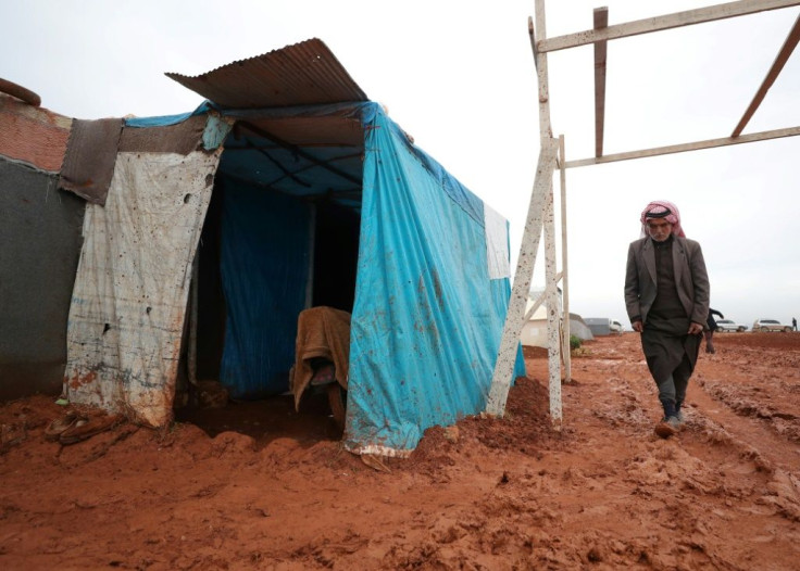 An elderly Syrian man by his tent in a camp for displaced people in northern Syria: Russia and the West are in a struggle at the UN over the renewal of humanitarian aid to millions of such people