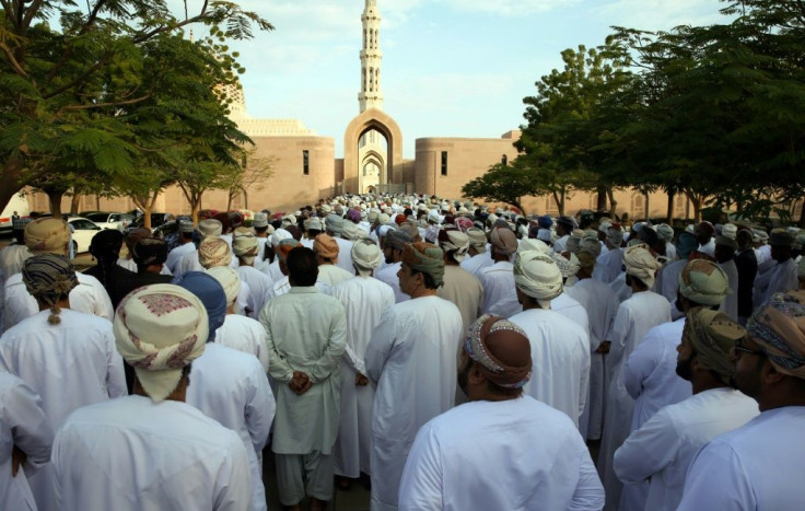 Omanis gathered to enter the Sultan Qaboos Mosque to perform the funeral prayer for the deceased sultan