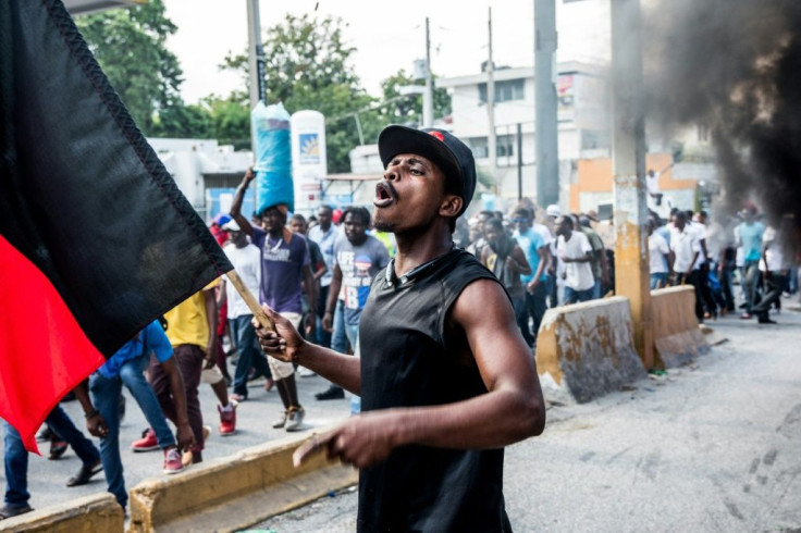Protesters in Port-au-Prince on November 18, 2019, demanded the resignation of President Jovenel Moise, amid widespread bitterness over government failures since the 2010 quake