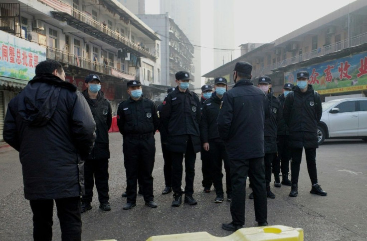 Huanan Seafood Wholesale Market in the city centre -- where multiple pneumonia patients worked -- is still cordoned off