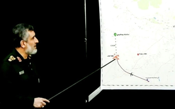 Iranian state TV shows Brigadier General Amir Ali Hajizadeh, aerospace commander of Iran's Revolutionary Guards, pointing at a map during a press conference. Iran said it unintentionally shot down a Ukrainian passenger jet, killing all 176 people aboard