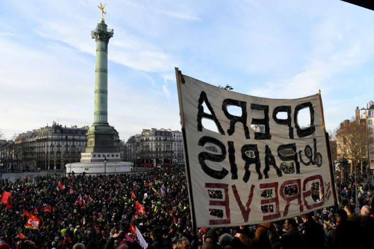 Demonstrators in the capital on Saturday  broke shop windows along their protest route, set fires and threw projectiles at police in riot gear who responded with tear gas