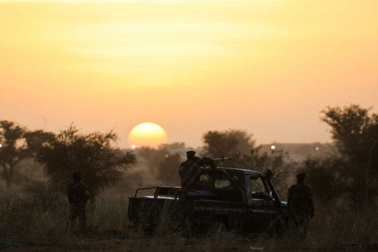 A military ceremony on December 22, 2019, in Niamey, paying homage to 71 Nigerien soldiers massacred in an attack -- about a month before 89 other troops from Niger were slain by jihadists