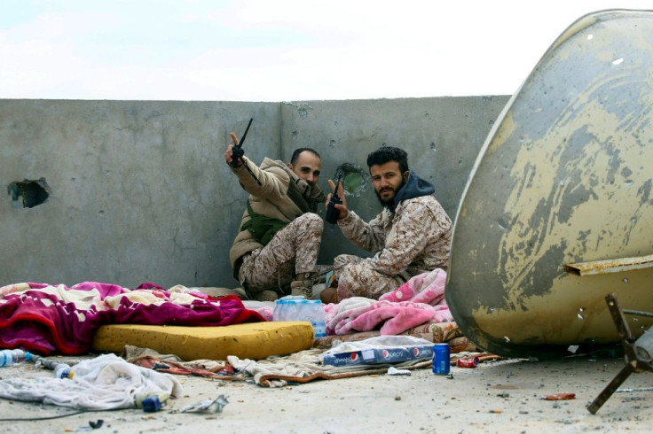 Fighters loyal to the internationally recognised Libyan Government of National Accord (GNA) on the roof of a building in an area south of the Libyan capital Tripoli