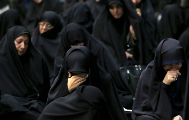 Supporters of the Basij, a militia loyal to the Islamic republic's establishment, attend a memorial for the victims of the Ukraine plane crash in University of Tehran