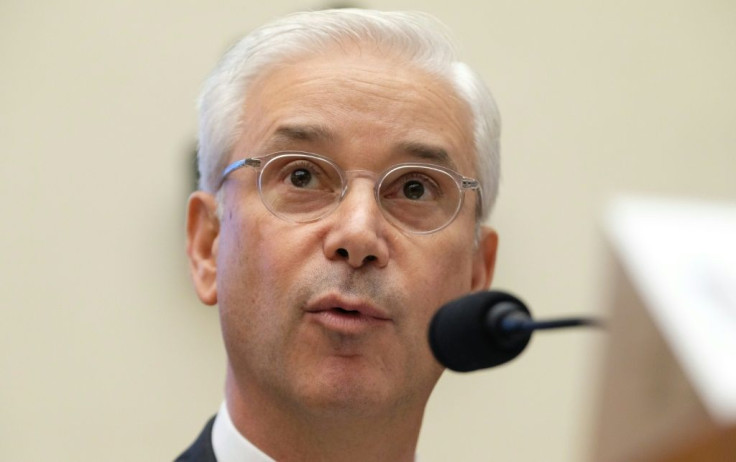 Wells Fargo Chief Executive Charles Scharf, shown here at a congressional hearing last year, cited high costs as he seeks to turn around the struggling bank