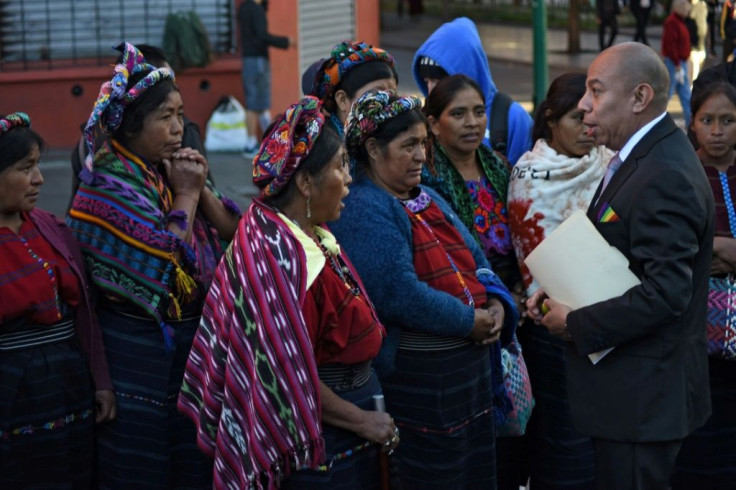 Aldo Davila (R) of the left-wing Winaq party, Guatemala's first openly gay and HIV positive congressman, told AFP that outgoing president Morales "was always on the side of corruption and impunity"