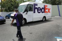Amazon said it would reinstate FedEx as a shipper for third-party merchants on Prime orders after suspending the delivery service last year