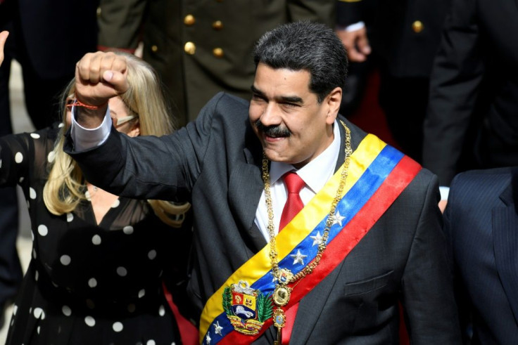 Maduro raises a clenched fist as he arrives to make his annual address to Venezuela's Constituent Assembly in Caracas