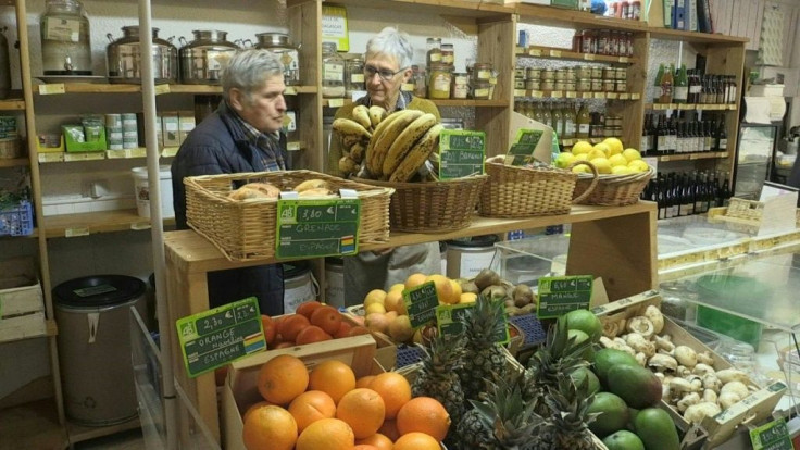 Villagers in Sauxillanges take turns manning the till in the town's last remaining grocery store following a rural exodus from the region