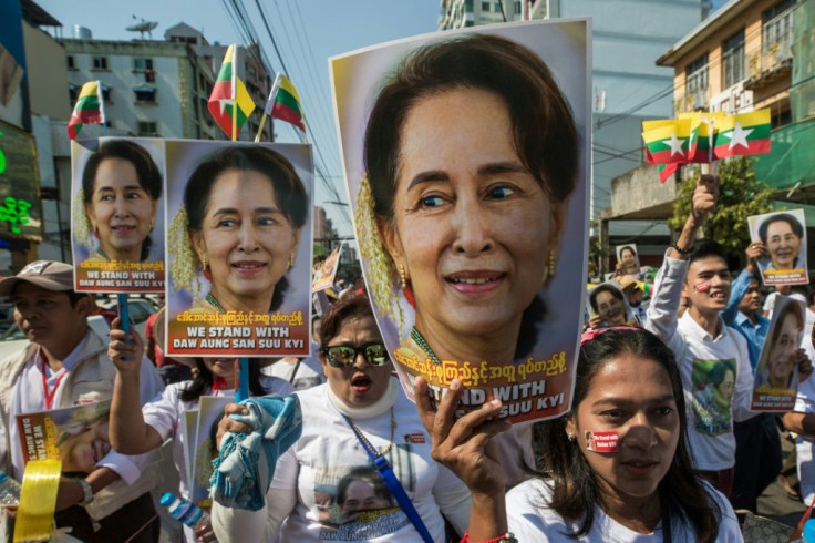 Demonstrators rally in Yangon in support of Myanmar leader Aung San Suu Kyi before her defence of the country at the UN in December