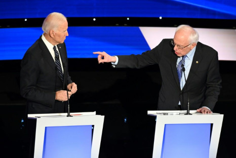 US former vice president Joe Biden (L) and liberal Senator Bernie Sanders were two of the six candidates who clashed during the final Democratic presidential debate before Iowa begins the voting process on February 3, 2020