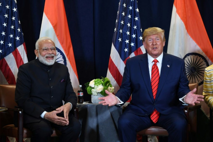 US President Donald Trump, seen here with Indian Prime Minister Narendra Modi, did not know that India shared a border with China, according to a new book