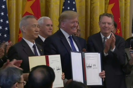 US President Donald Trump and China's Vice Premier Liu He sign "phase one" of a new partial trade agreement
