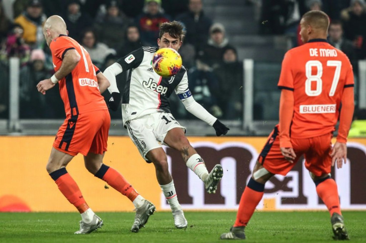Paulo Dybala lofted the ball into the far corner for the third Juventus goal