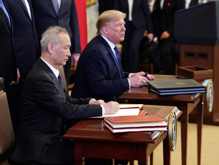 Chinese Vice Premier Liu He signed the trade pact with Donald Trump at the White House, providing some much-needed relief to global markets as tensions between the economic superpowers ease for now