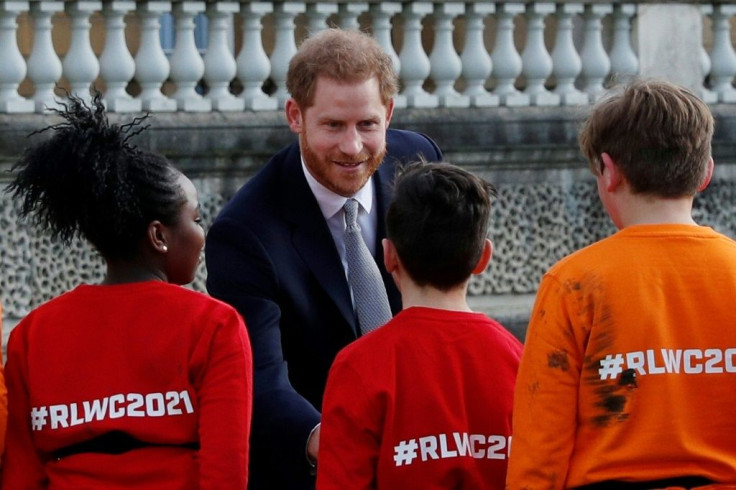 Prince Harry appeared relaxed and jovial despite the tumult surrounding him