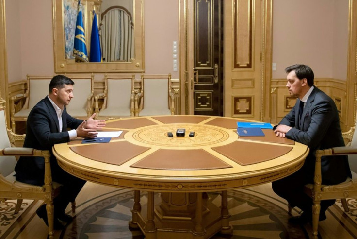 A video released by the presidency showed the two holding a round-table meeting in an ornate, gilded room