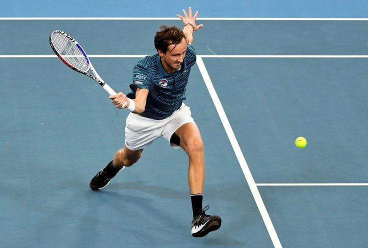 Daniil Medvedev of Russia hits a return in his men's singles match against Novak Djokovic of Serbia at the ATP Cup tennis tournament in Sydney on January 11, 2020.