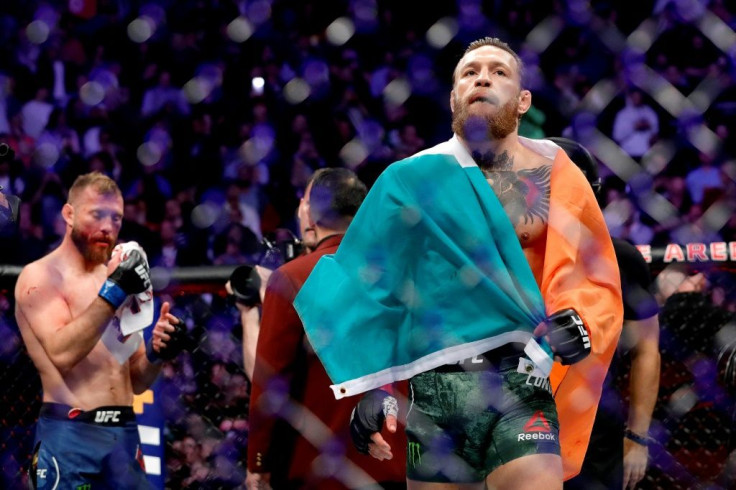 Ireland's Conor McGregor celebrates his first round TKO victory against American Donald Cerrone in a welterweight bout during UFC246 in Las Vegas