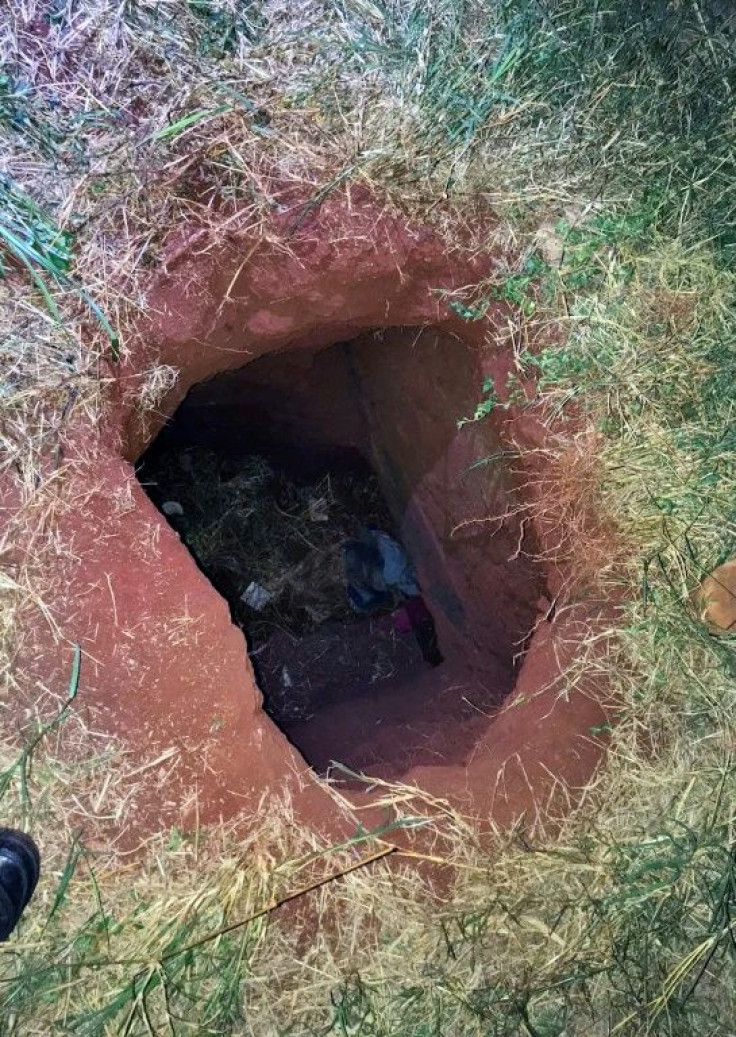 Handout picture released by Paraguay's ABC TV showing the end of the tunnel through which 76 inmates allegedly escaped from the prison in Pedro Juan Caballero, 500 kilometers northeast of Asuncion