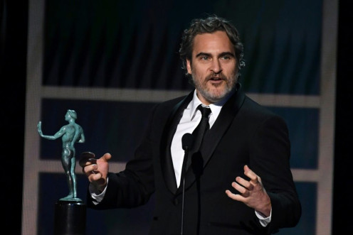 US actor Joaquin Phoenix accepts the award for Outstanding Performance by a Male Actor in a Leading Role during the 26th Annual Screen Actors Guild Awards show