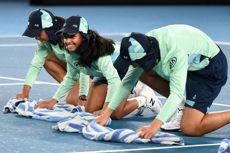 Rain halted play on the outside courts on day one