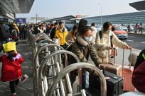 Hundreds of millions of Chinese people head to their hometowns for Lunar New Year but many travellers seemed unfazed by the mystery virus
