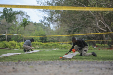 Forensic specialists begin working on exhuming the remains of people killed during the 1989 US invasion of Panama at the Jardin de Paz cemetery in Panama City, on January 20