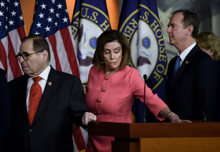 Speaker of the House Nancy Pelosi, flanked by Impeachment Managers Rep. Adam Schiff (R) and Rep. Jerry Nadler, leaves a press conference after annoncing the impeachment managers on Capitol Hill January 15, 2020
