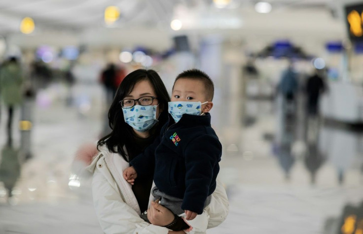 Airport health screenings have been stepped up across China and Asia, including at Beijing's Daxing airport, seen here -- in the US, five international airports will now check passengers arriving from the Chinese city of Wuhan