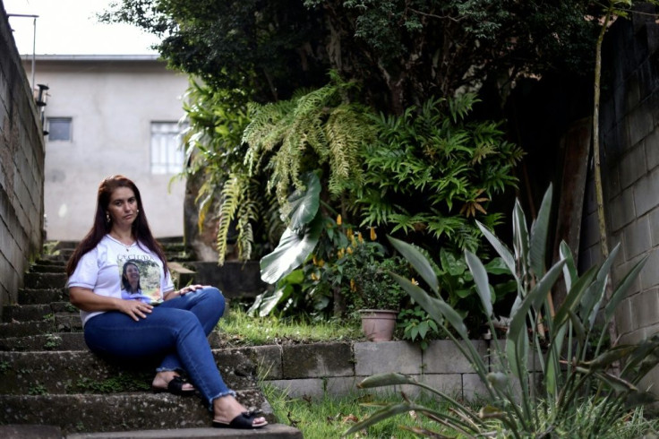 Natalia de Oliveira, who lost her sister in the January 25, 2019 collapse of a dam in Brazil, poses for a photo in the southeastern town of Brumadinho on January 7, 2020