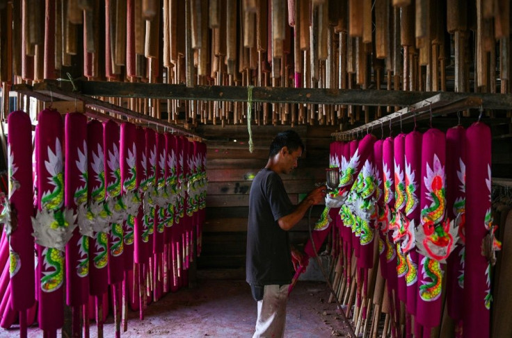 Workers spend months using a traditional method to craft the sticks -- some as tall as two metres (6.5 feet)
