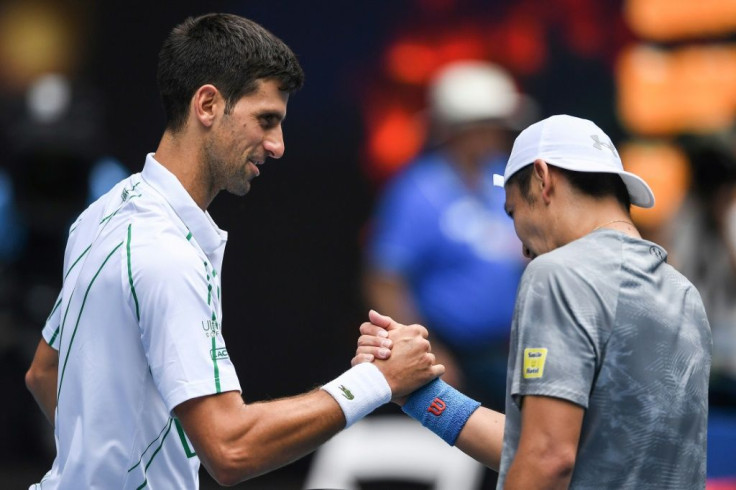 Serbia's Novak Djokovic weathered windy conditions in his won over Tatsuma Ito