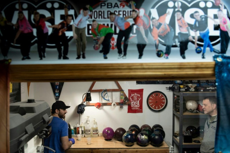 The Sheffield Lanes bowling alley in Aliquippa, Pennsylvania is packed on a weeknight with regulars drawn by specials, homemade pizzas and even an intimately grungy punk club