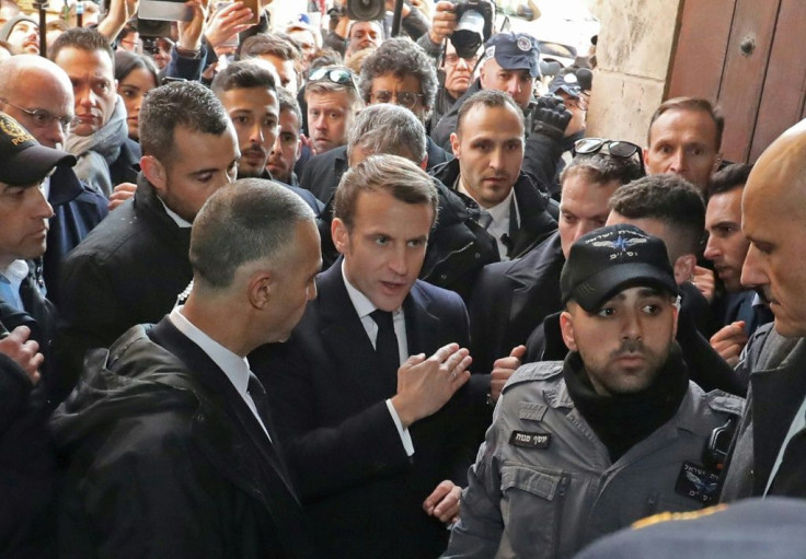 French President Emmanuel Macron asks Israeli security forces to leave the 12th-century Church of Saint Anne in the old city of Jerusalem on Wednesday