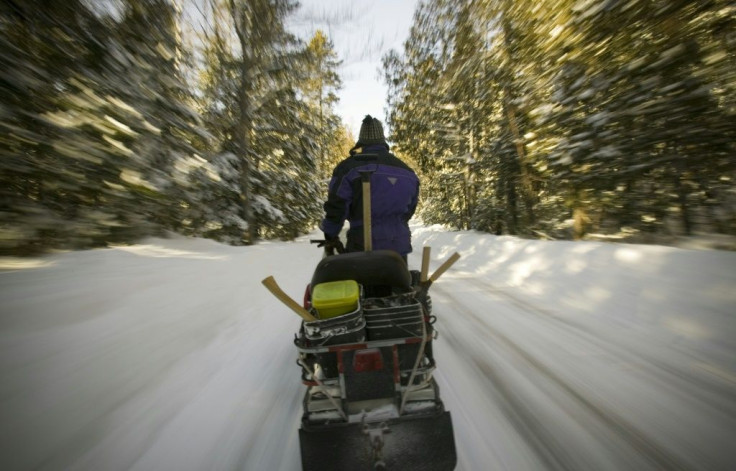 Snowmobiles are popular in Canada but can be dangerous -- a guide died and five French tourists were missing after the group plunged through ice