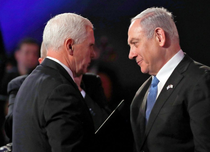 US Vice President Mike Pence (L) greets Israeli Prime Minister Benjamin Netanyahu during the Fifth World Holocaust Forum in Jerusalem on January 23, 2020; Pence invited Netanyahu and his main election rival to Washington next week