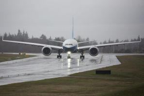 A Boeing 777X airplane taxis for its first flight at Paine Field in Everett, Washington