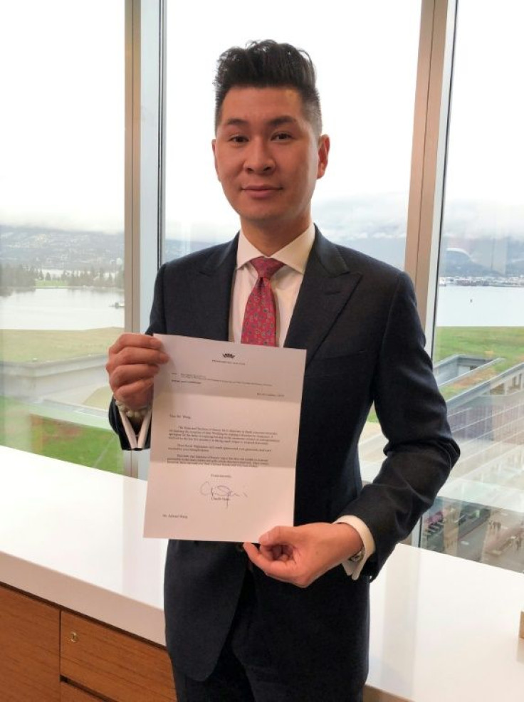 Vancouver lawyer and royal commentator Edward Wang holds a letter from the Duke and Duchess of Sussex thanking him for making a donation to the Jumpstart charity on the occasion of their wedding in 2018