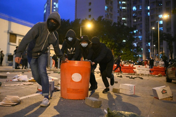 Residents set up barricades near the vacant Fai Ming Estate to protest against plans for the estate to be used as a quarantine camp for patients and frontline medical staff of the Novel Coronavirus