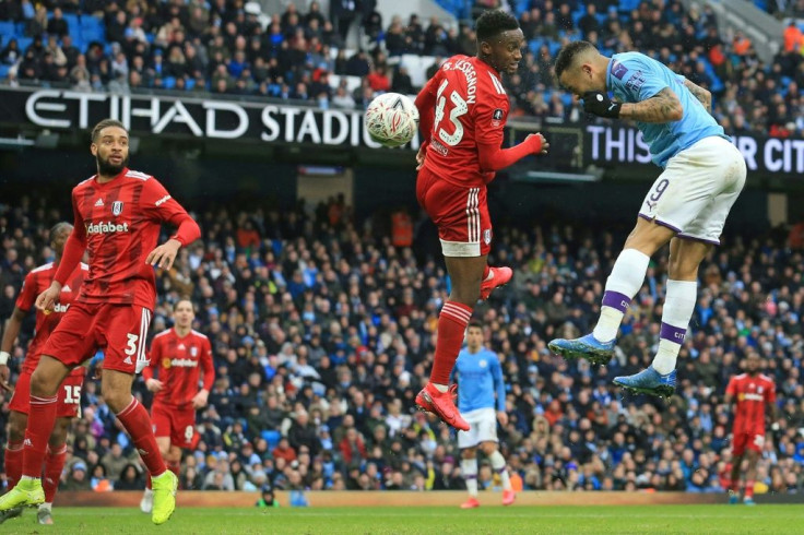 Gabriel Jesus scores the first of his two goals against Fulham