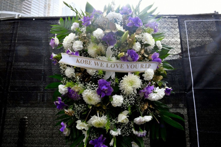 A wreath hangs at the makeshift memorial for former NBA and Los Angeles Lakers player Kobe Bryant, at LA Live Paza in front of the Staples Center in Los Angeles