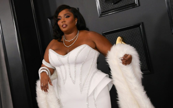 US singer-songwriter Lizzo rocks a Versace corset gown at the Grammys