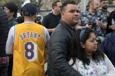 People gather near the scene of a helicopter crash in Calabasas on Sunday, January 26, 2020 that killed 9 people including Los Angeles Laker star Kobe Bryant and his daughter Gianna