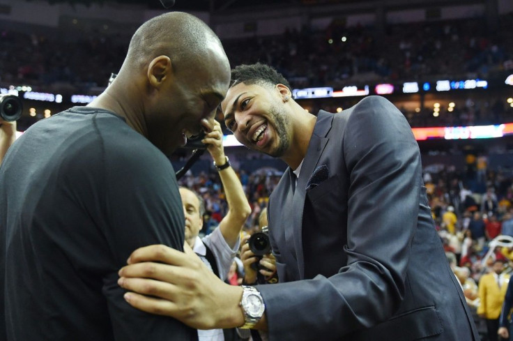 Los Angeles Lakers star Anthony Davis, right, shares a 2016 laugh and one of the moments he says he will "cherish forever" with Lakers legend Kobe Bryant, who died Sunday in a helicopter crash