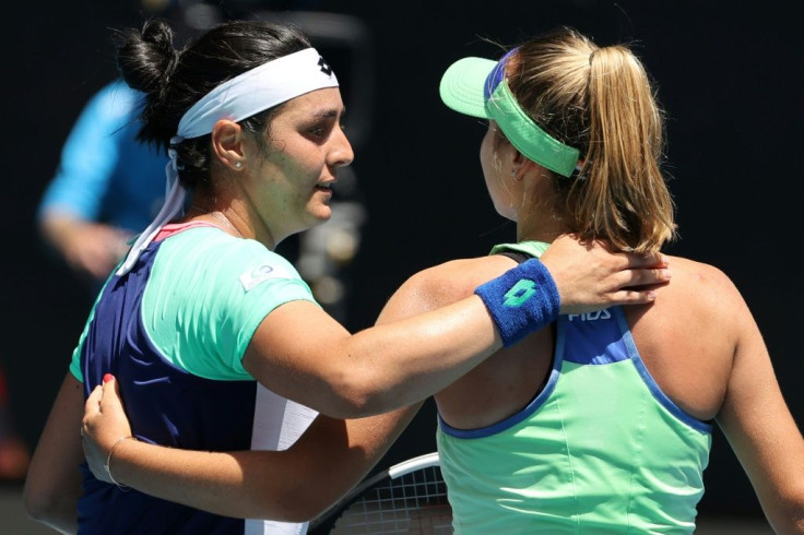 Sofia Kenin (R) defeated Ons Jabeur 6-4, 6-4 and now faces top seed Ashleigh Barty or Czech seventh seed Petra Kvitova in the last four in Melbourne