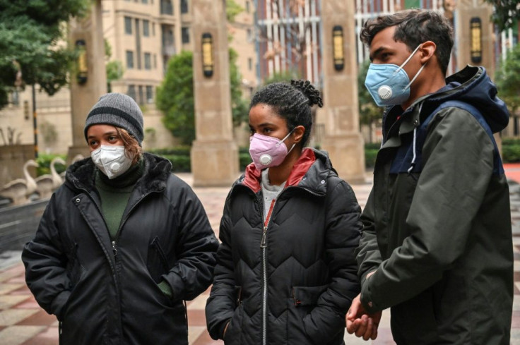 Students from the Dominican Republic  speak during a interview with AFP about the possibility of being evacuated from Wuhan