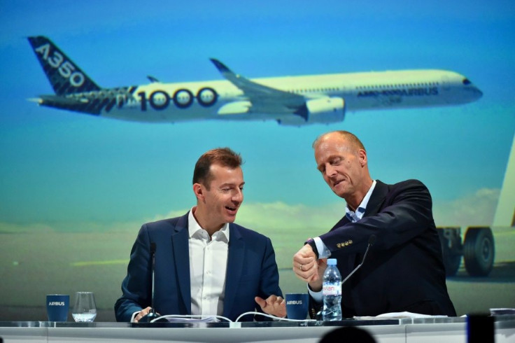 An internal Airbus probe was a factor in the departure of executive chairman Tom Enders (R), who was replaced as chief executive by Guillaume Faury (L)